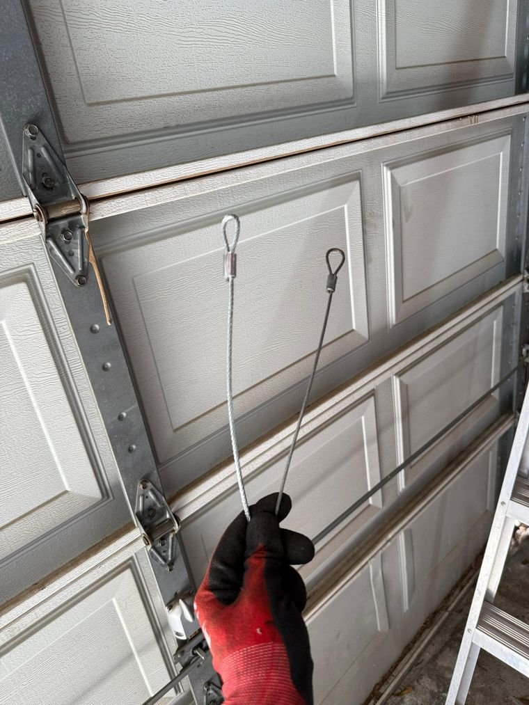 Garage door cable and hardware repair